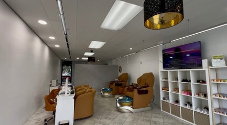 Interior view of Eloura Nail with plush seating in Plympton, South Australia, AU.