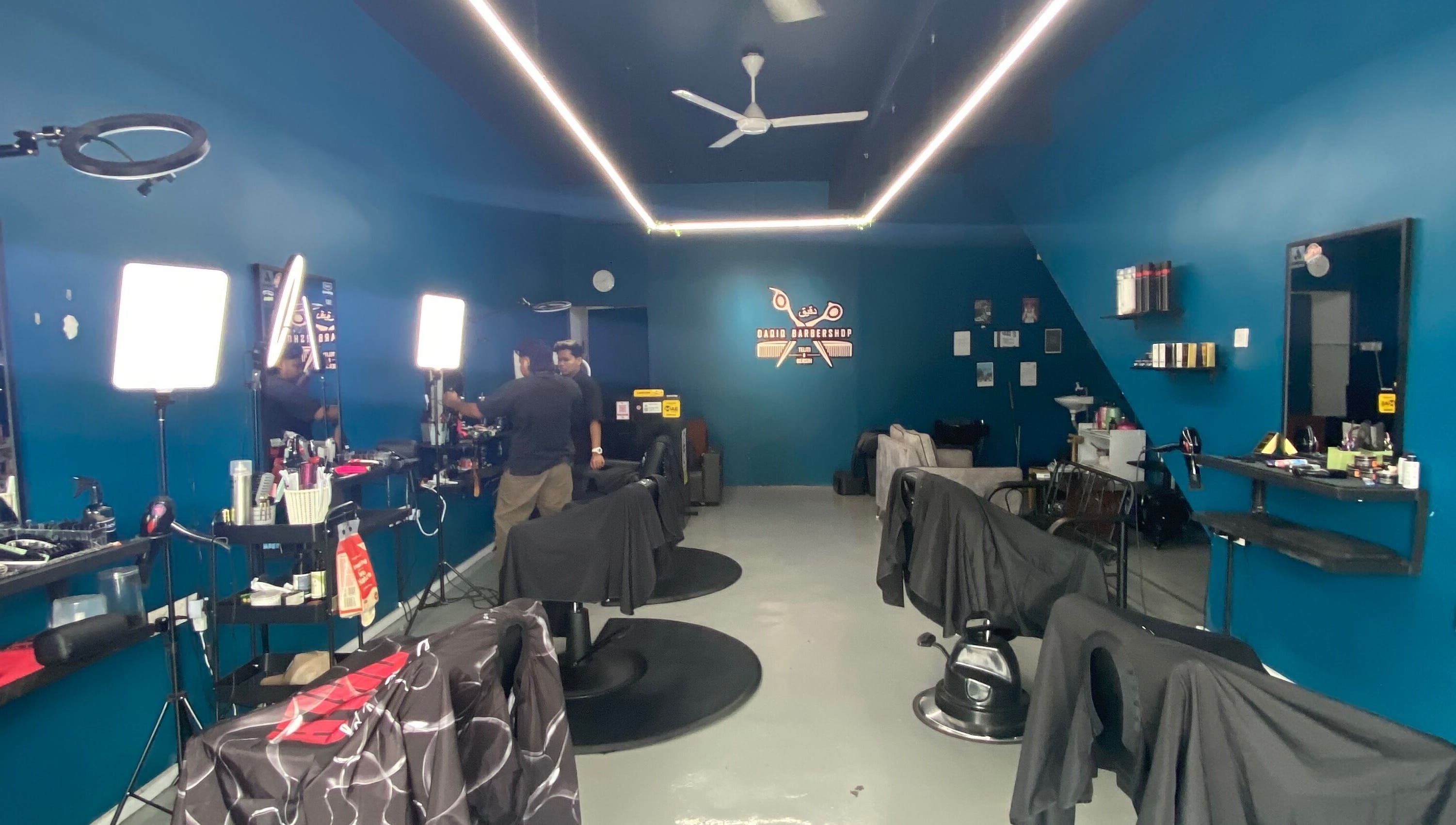Interior of Daqiq Barbershop showcasing modern barber chairs in Simpang Empat, Kedah, MY.