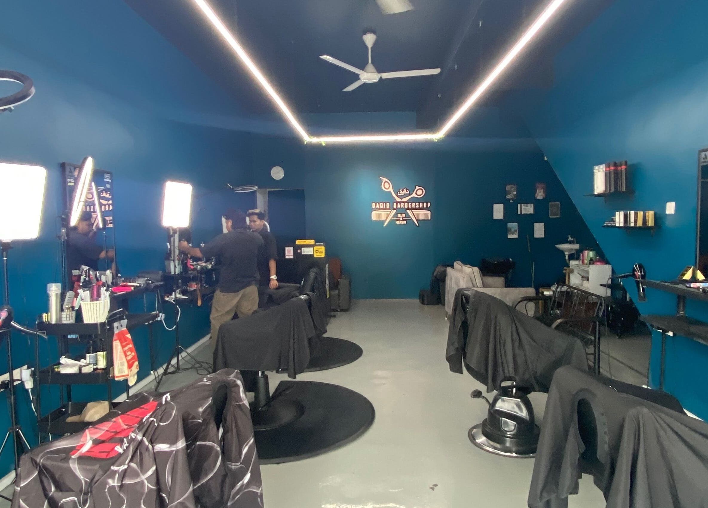 Interior of Daqiq Barbershop showcasing modern barber chairs in Simpang Empat, Kedah, MY.