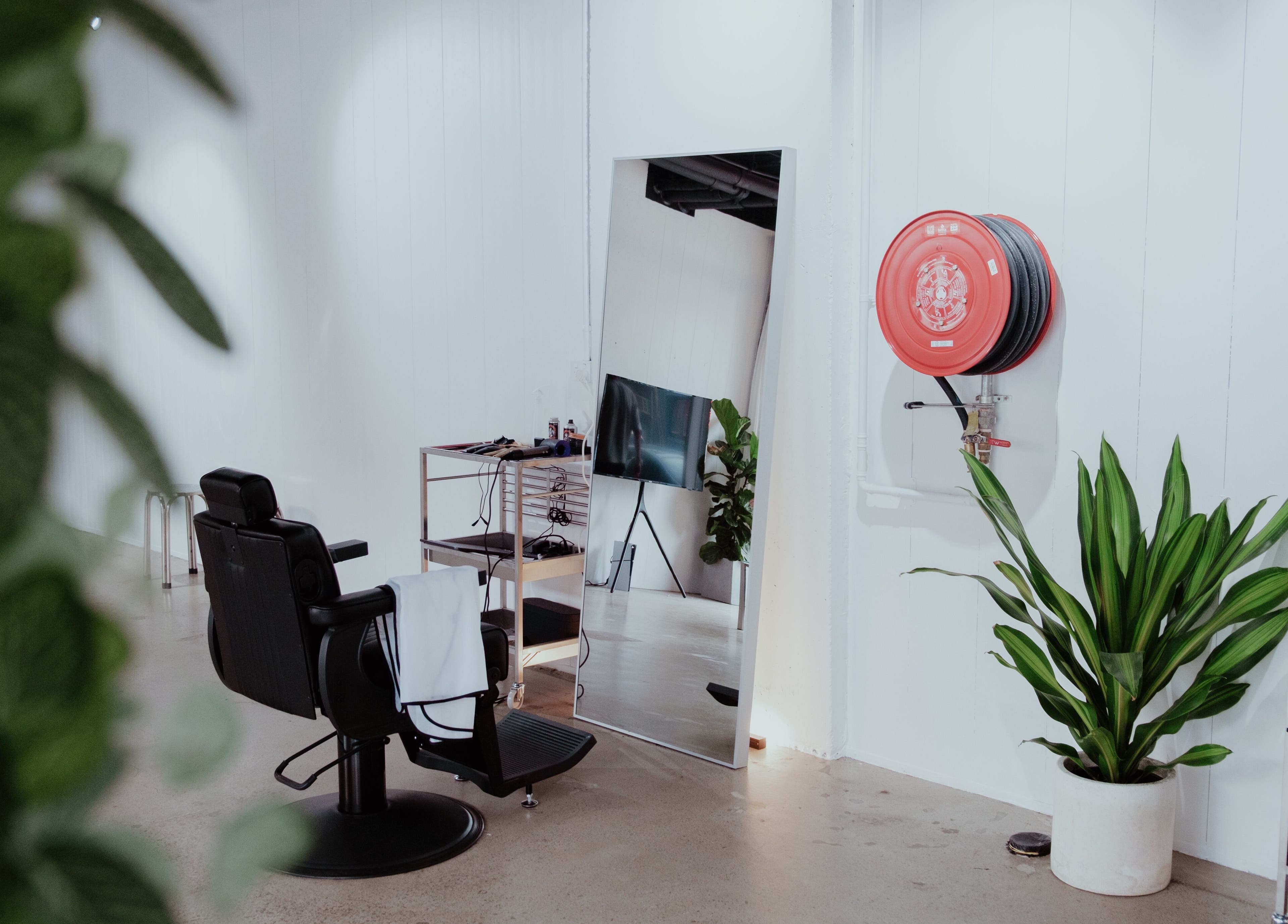 Modern styling chair and mirror in Studio.M, Camperdown, New South Wales, AU.
