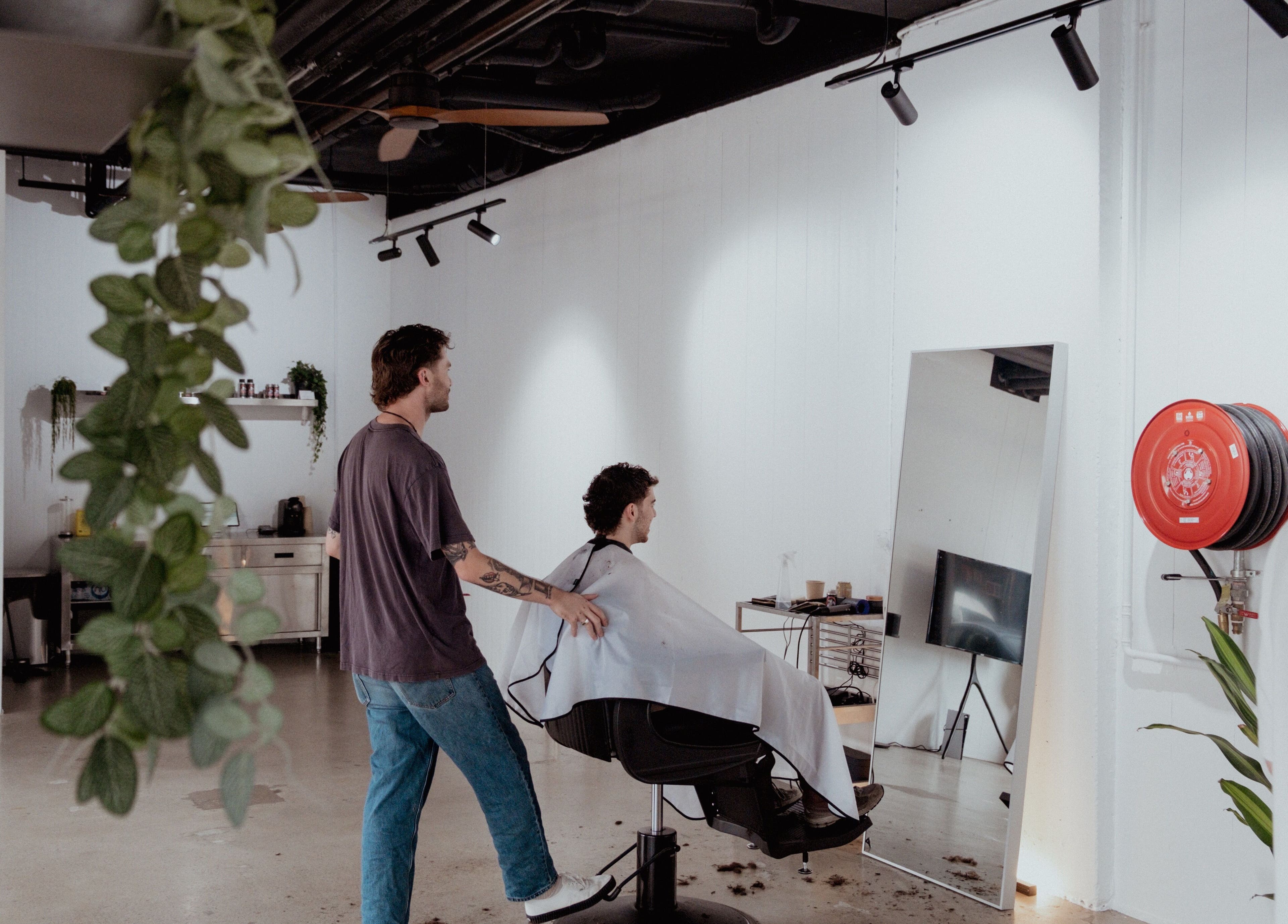 Stylish haircut session at Studio.M, Camperdown, New South Wales, AU, in a chic, modern salon environment.