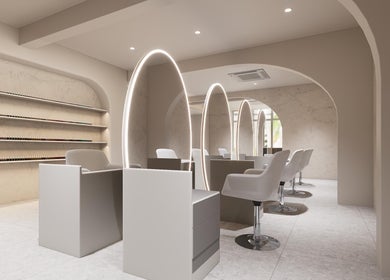 Modern seating and mirrors at LILS SALON in Cyberjaya, Selangor, MY offering a chic beauty experience.