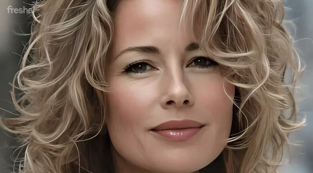 Blonde model with stylish curls at Nita’s hair studio, Cape Town, Western Cape, ZA.