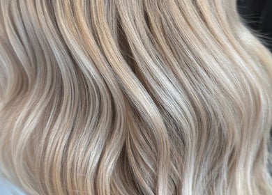 Blonde waves styled at Beau Hair, Gilberdyke, England, GB, showcasing silky, radiant hair.