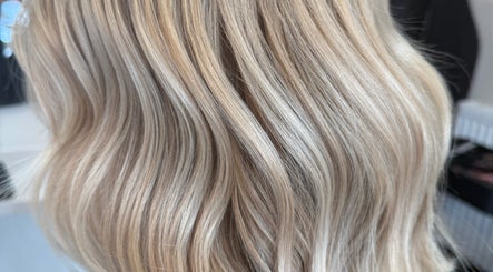 Blonde waves styled at Beau Hair, Gilberdyke, England, GB, showcasing silky, radiant hair.