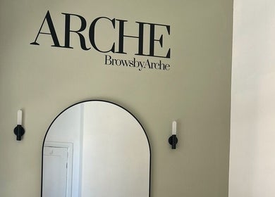 Elegant interior at ARCHE in Guisborough, England, GB with stylish wall decor and modern mirror.
