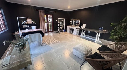 Spacious, modern interior of Bella Tu Beauty Styling in Pretoria, Gauteng, ZA featuring elegant decor and styling stations.
