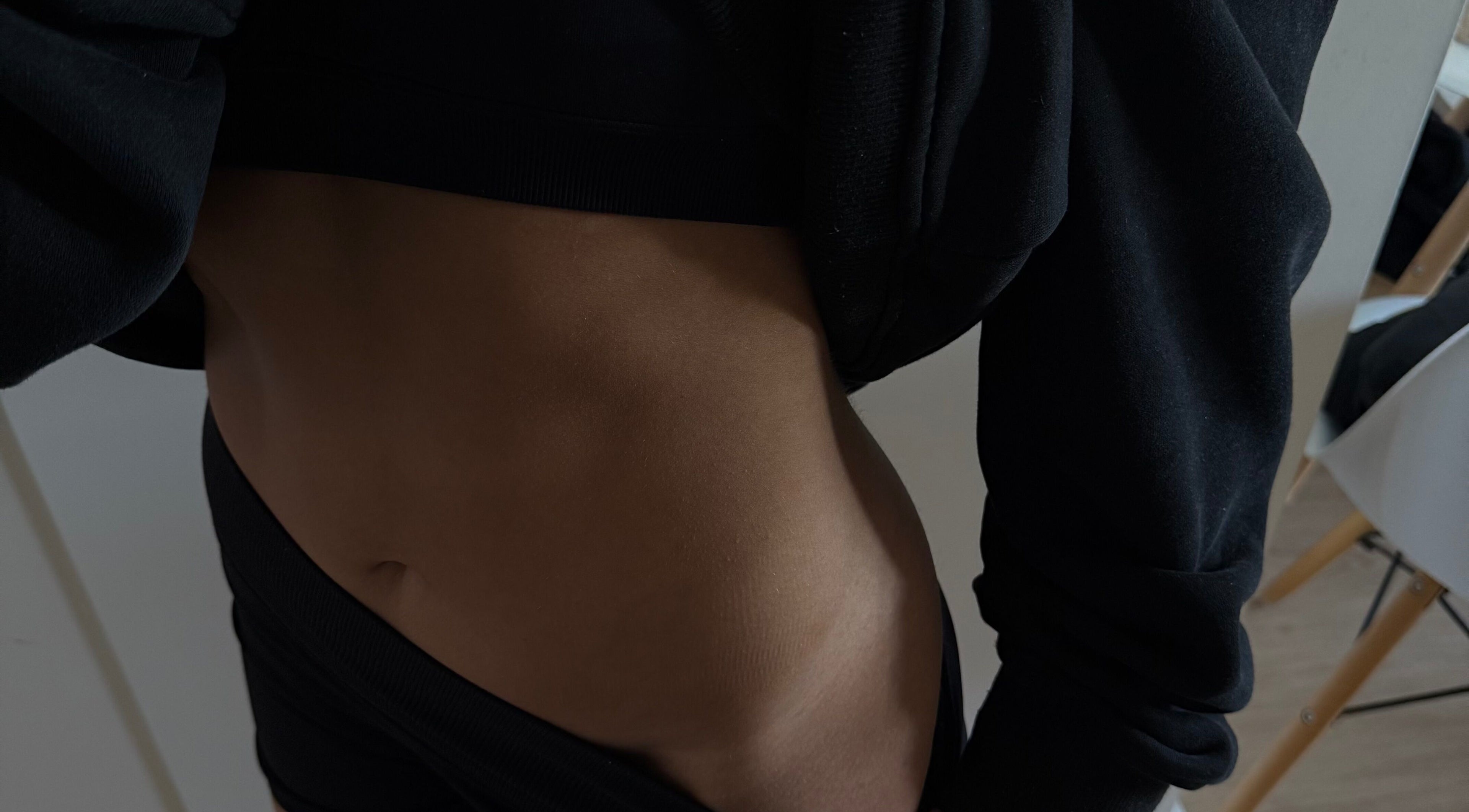 Tanned midsection at Makeme.TAN, Lightsview, South Australia, AU, showcasing a smooth, bronzed skin tone.