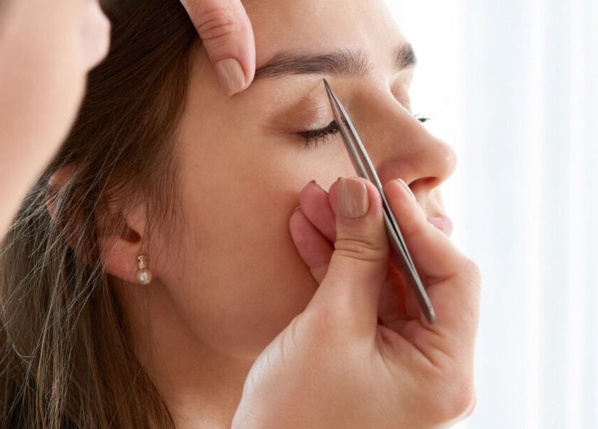 Expert brow shaping at New Era Brows & Beauty in Chiswick, New South Wales, AU.