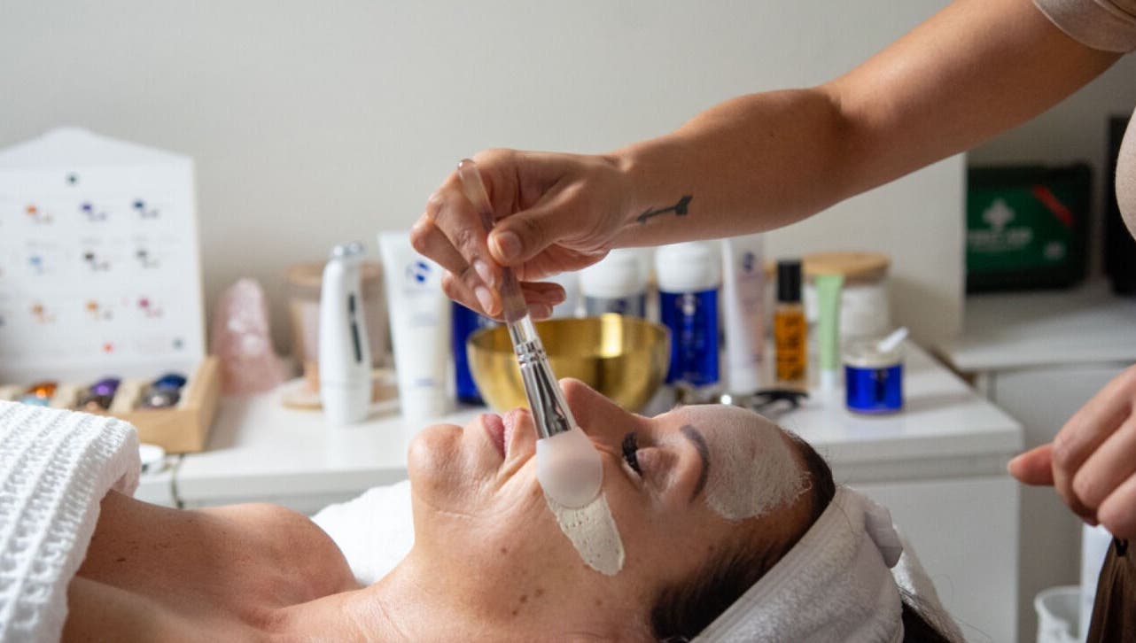 Facial treatment at Skin By Nik, Solihull, England, GB. Relaxing spa experience with face mask application.