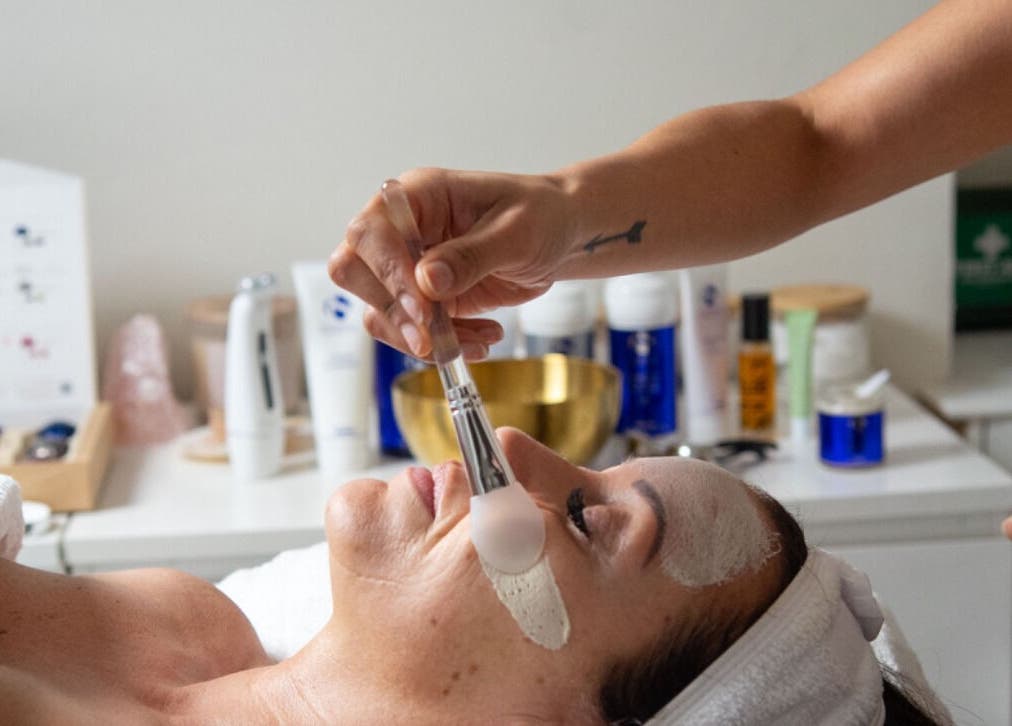 Facial treatment at Skin By Nik, Solihull, England, GB. Relaxing spa experience with face mask application.