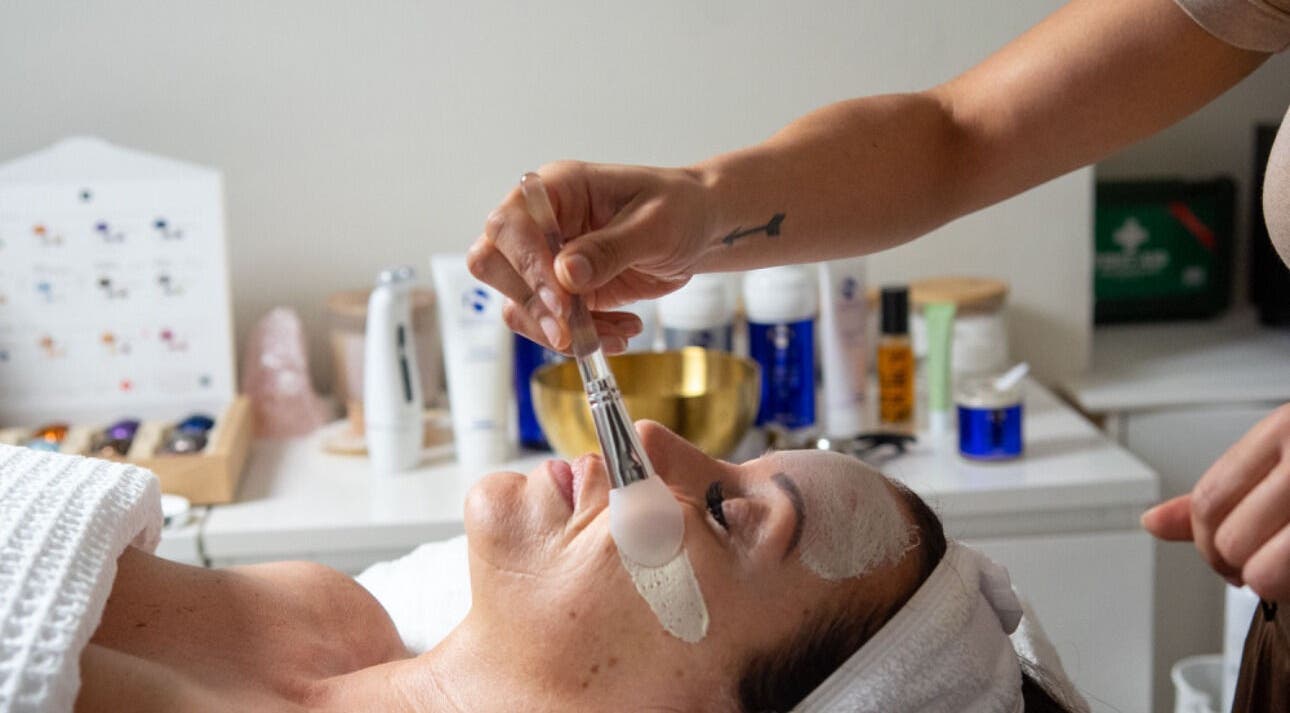 Facial treatment at Skin By Nik, Solihull, England, GB. Relaxing spa experience with face mask application.