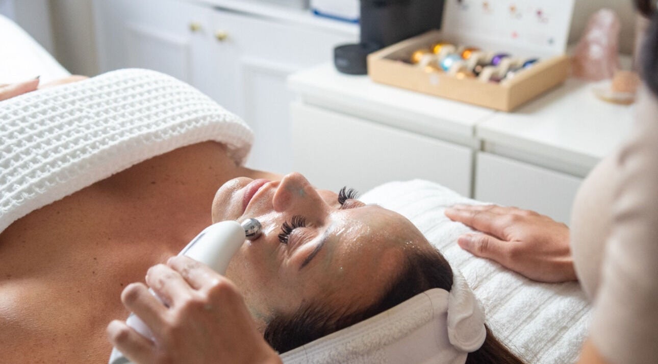 Facial treatment at Skin By Nik, Solihull, England, GB, enhancing skin glow and wellness.