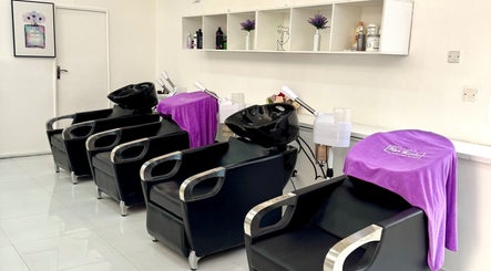 Modern wash stations at Her Rootz Hair Studio, Lusaka, Lusaka Province, ZM, offering a sleek and clean vibe.