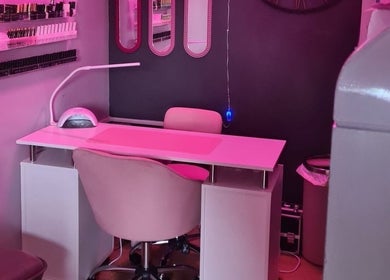 Nail station at Nikki Nailed it @ Tease 2 with pink lighting, Hazel Grove, England, GB.