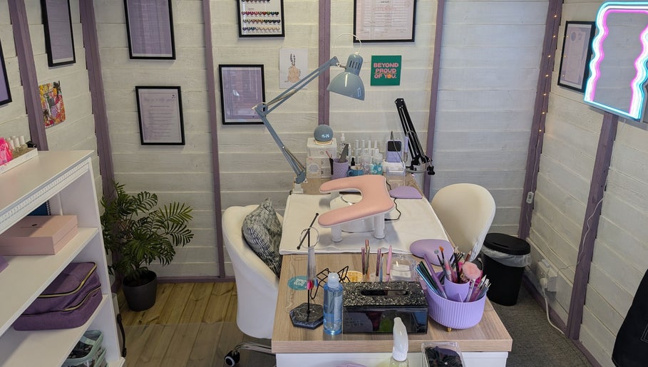 Chic nail studio at Nikki Nailed It, Hazel Grove, England, GB, featuring stylish decor and manicure setup.