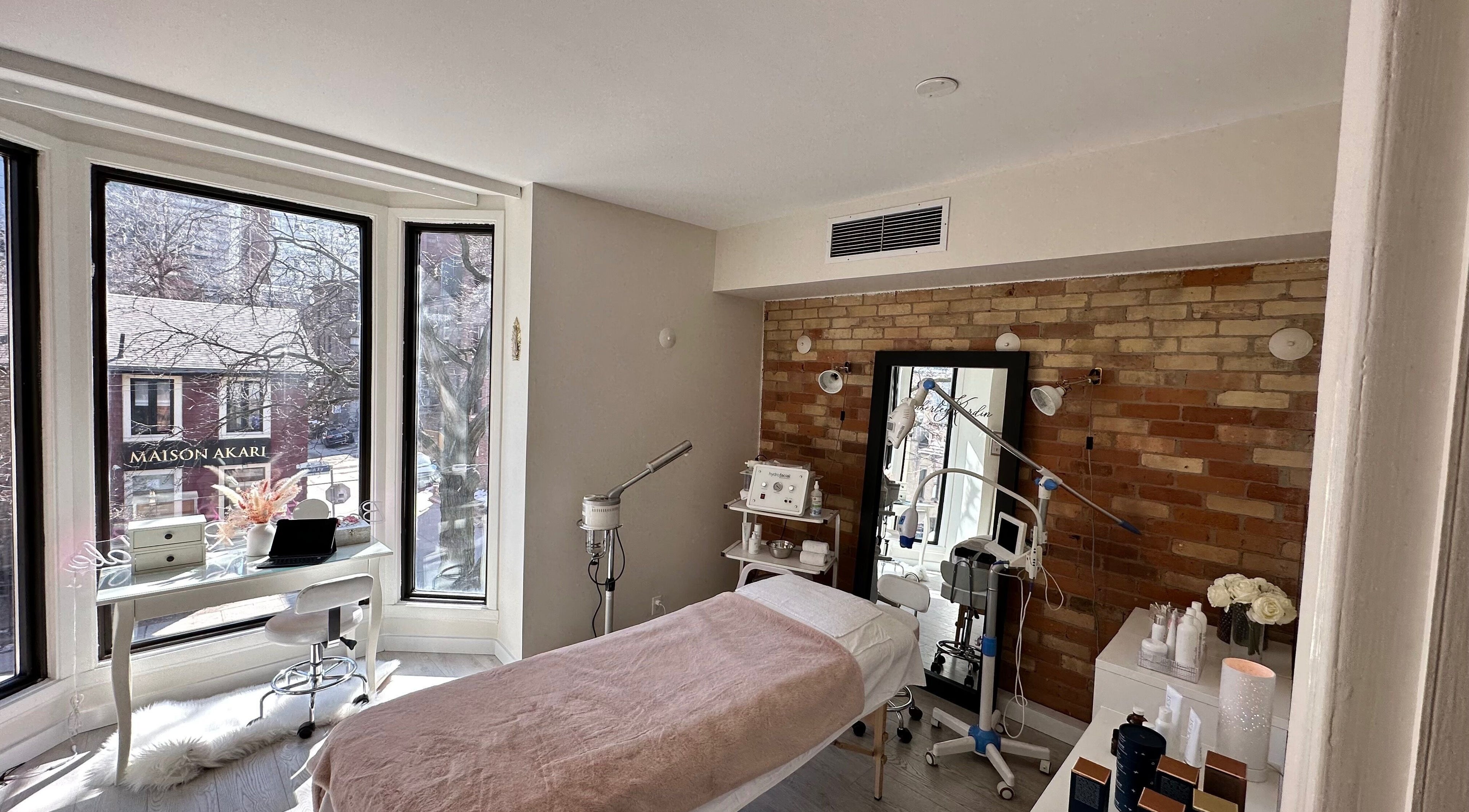 Bright, tranquil treatment room at Beauty in Rosedale, Toronto, Ontario, CA with modern equipment and cozy decor.