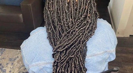 Intricate braid hairstyle at Hair & Skin By Amber in Conyers, Georgia, US, showcasing detailed craftsmanship.
