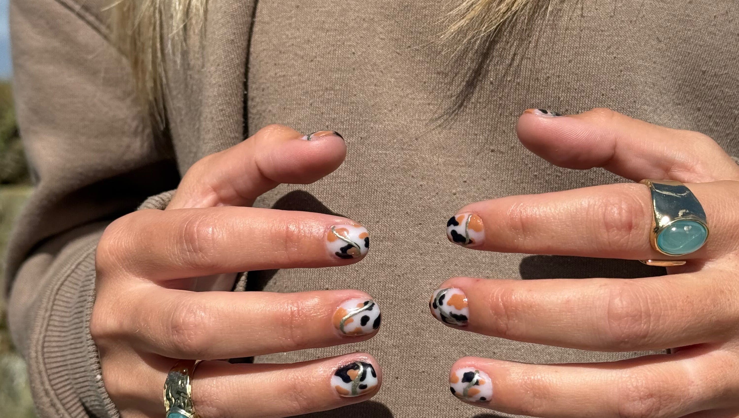 Stylish leopard nail art at Popsie Nails in Newquay, England, GB.