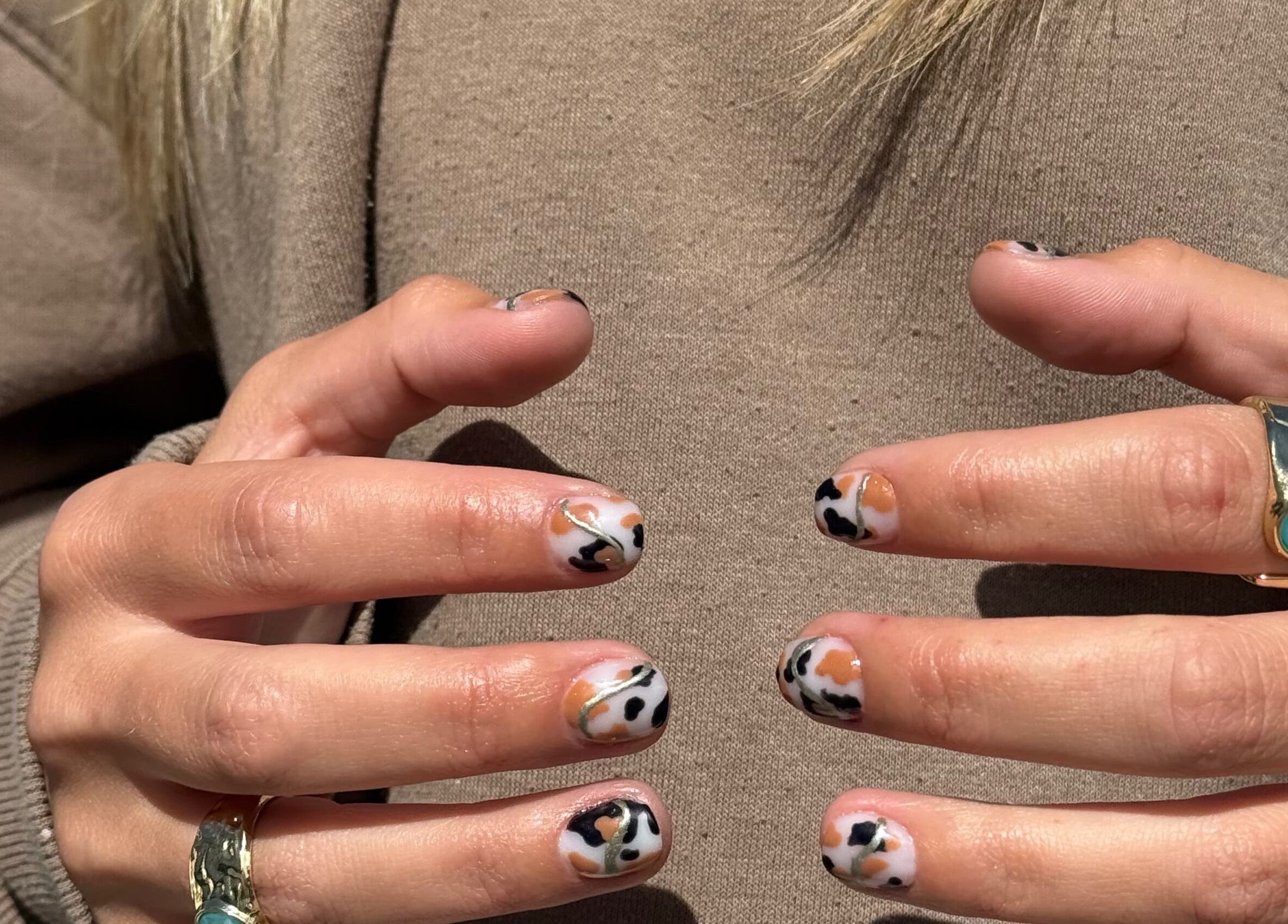 Stylish leopard nail art at Popsie Nails in Newquay, England, GB.