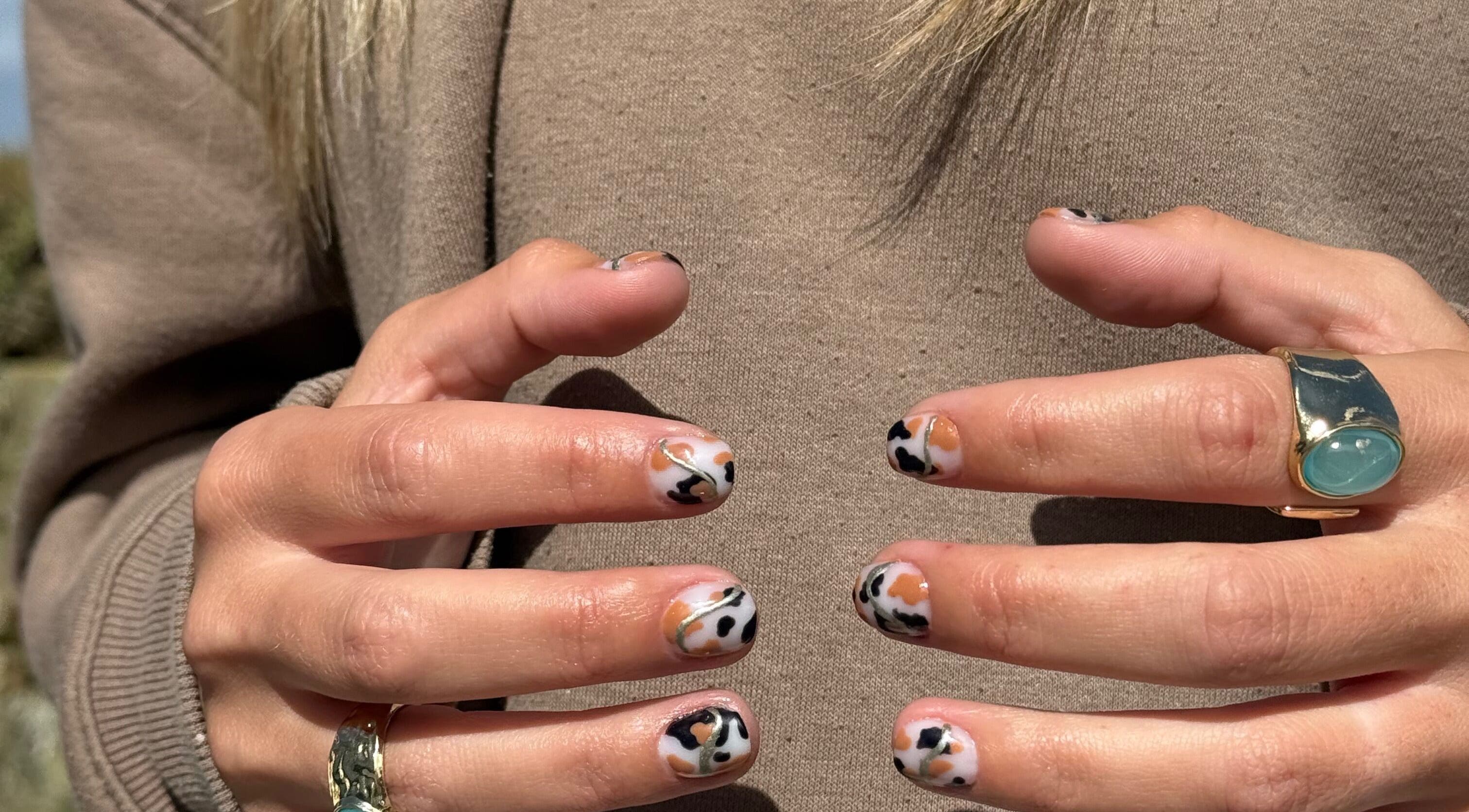 Stylish leopard nail art at Popsie Nails in Newquay, England, GB.