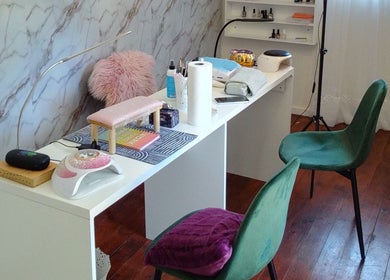 Nail station at The Nail Statement & Beauty Spa, Gqeberha, Eastern Cape, ZA. Elegant setup with chairs and tools.