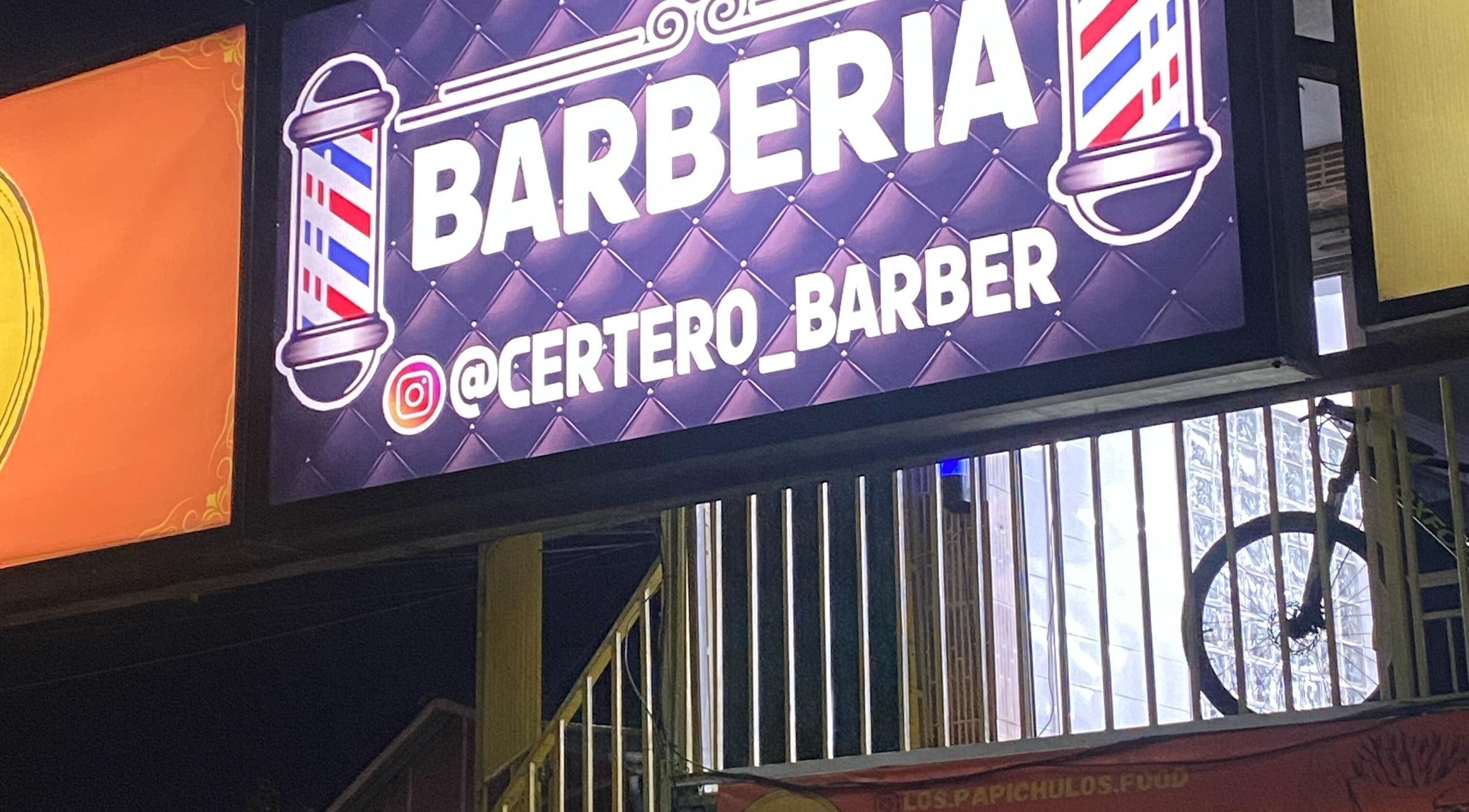 Illuminated Certero Barber storefront sign in Quilicura, Región Metropolitana, CL at night.