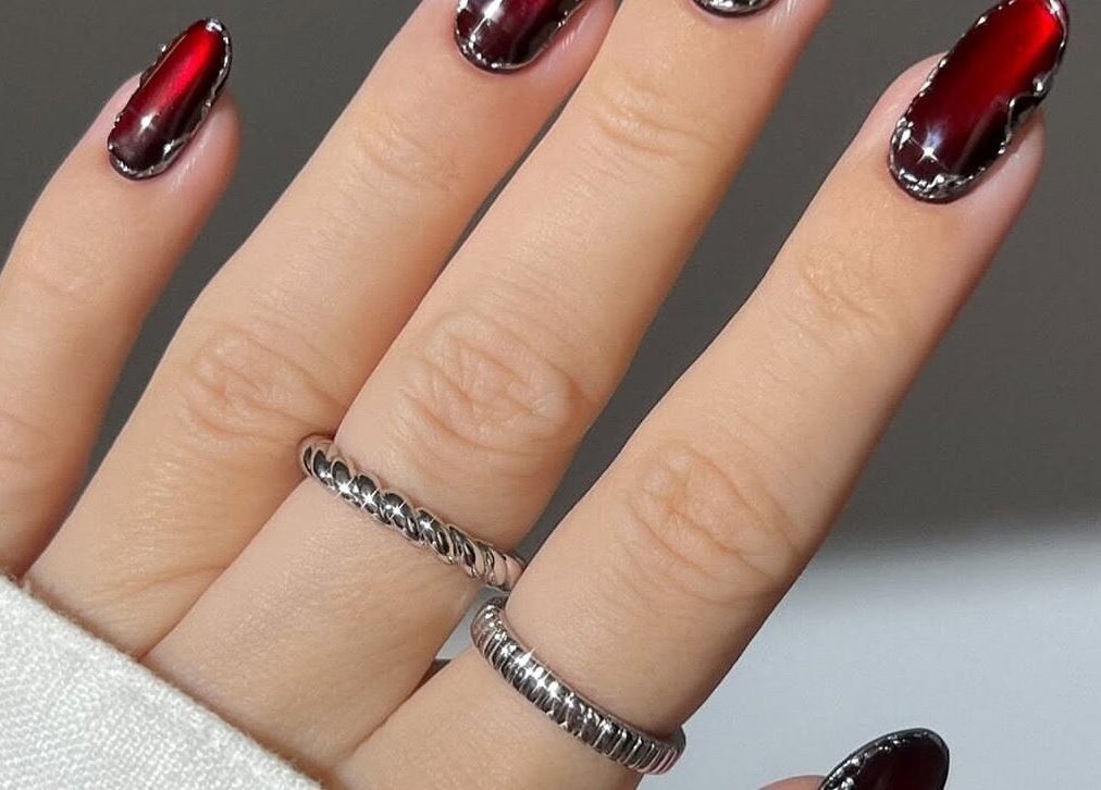 Elegant red glossy nails at Nails by Bon Washington in Washington, England, GB, showcasing premium nail art.