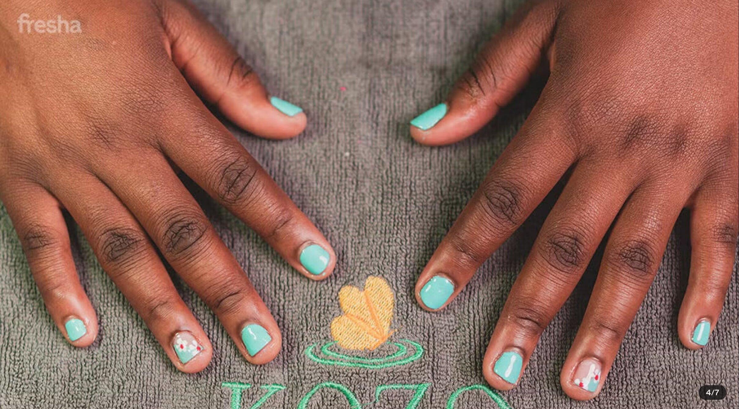 Mint nail art on a towel at Kozo Spa and Salon, Lusaka, Lusaka Province, ZM.