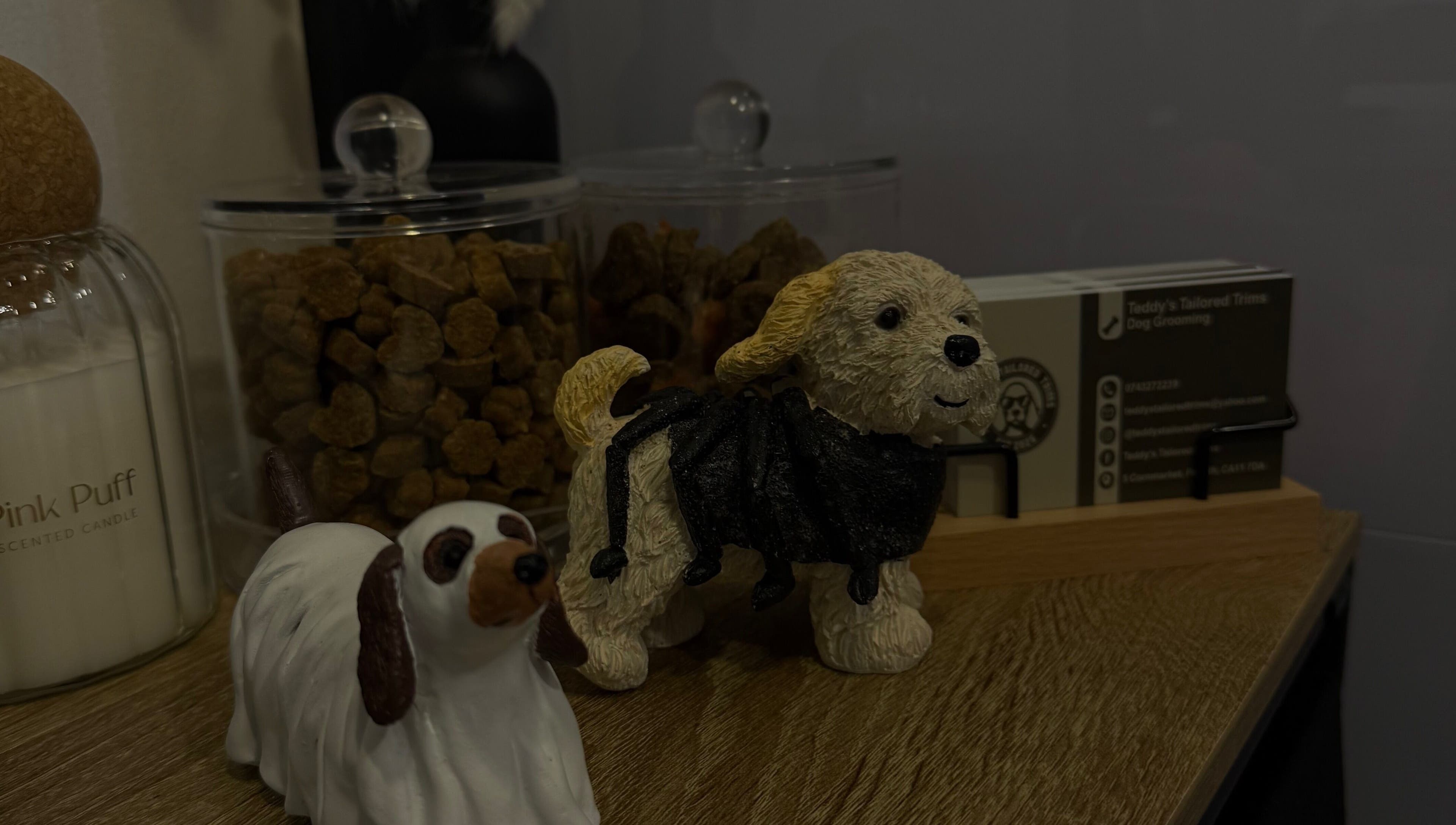 Charming dog figurines with treat jars at Teddy’s Tailored Trims, Penrith, England, GB.