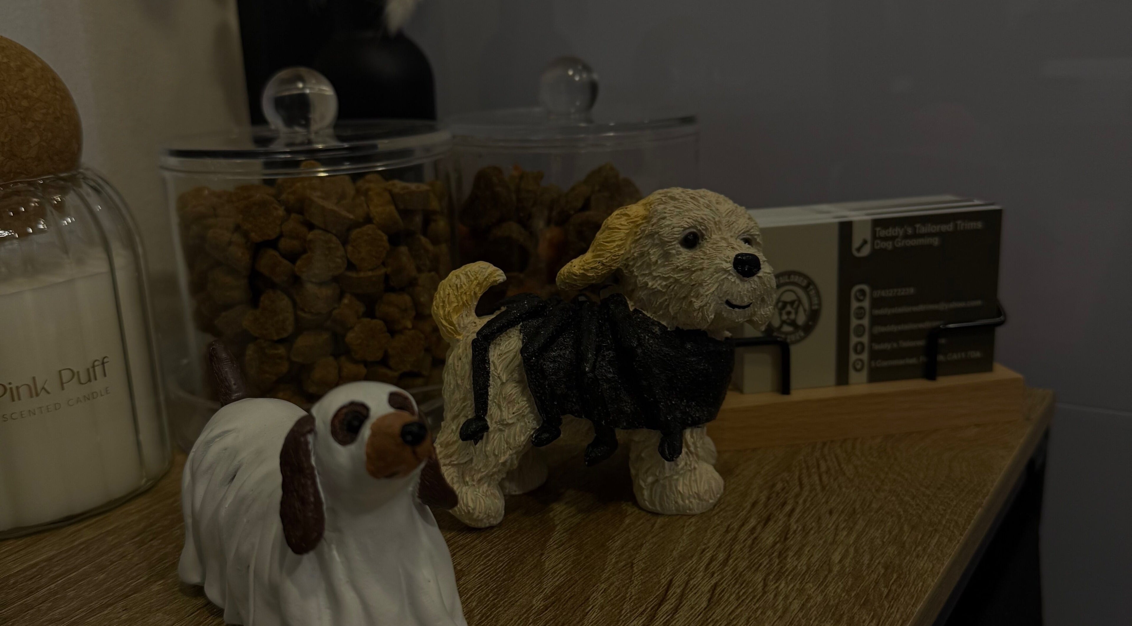 Charming dog figurines with treat jars at Teddy’s Tailored Trims, Penrith, England, GB.