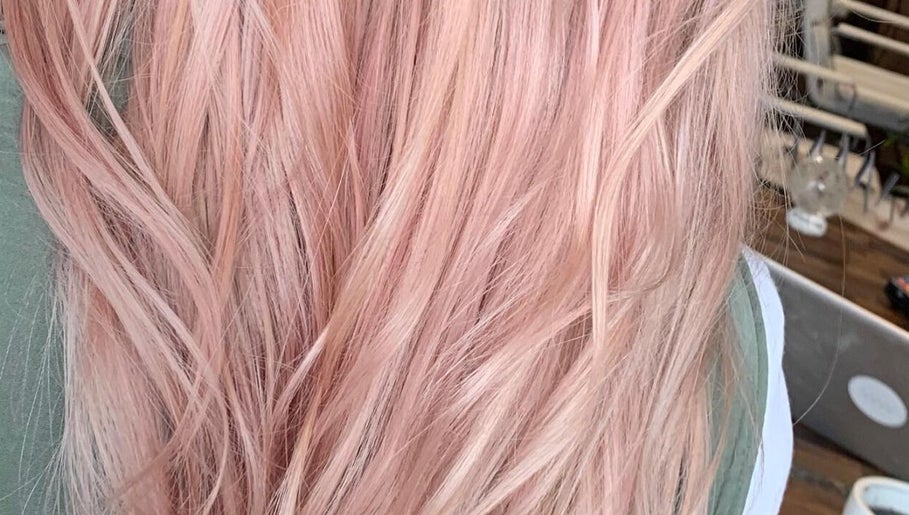 Stylish rose gold hair at Wolf and Wolf Salon, Auckland, Auckland, NZ, showcasing expert styling.