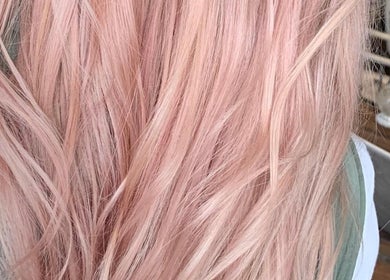 Stylish rose gold hair at Wolf and Wolf Salon, Auckland, Auckland, NZ, showcasing expert styling.