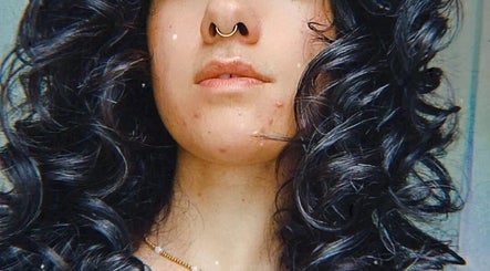 Close-up of curly hairstyle at Wolf and Wolf Salon, Auckland, Auckland, NZ.