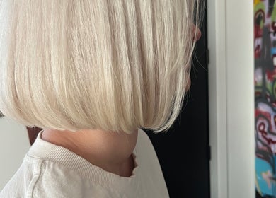 Chic blonde bob hairstyle at Wolf and Wolf Salon, Auckland, Auckland, NZ, showcasing precise hair cutting.