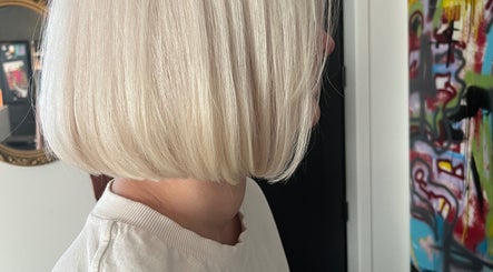 Chic blonde bob hairstyle at Wolf and Wolf Salon, Auckland, Auckland, NZ, showcasing precise hair cutting.