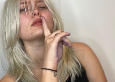 Elegant blonde hairstyle at Wolf and Wolf Salon, Auckland, NZ offering chic beauty solutions.