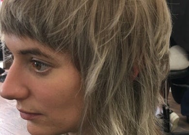 Trendy short haircut at Wolf and Wolf Salon, Auckland, NZ. Modern style with layered texture.