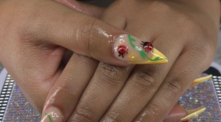 Intricate ladybird nail art at Nailsbybodgyal in Ottawa, Ontario, CA, showcasing vibrant and detailed designs.