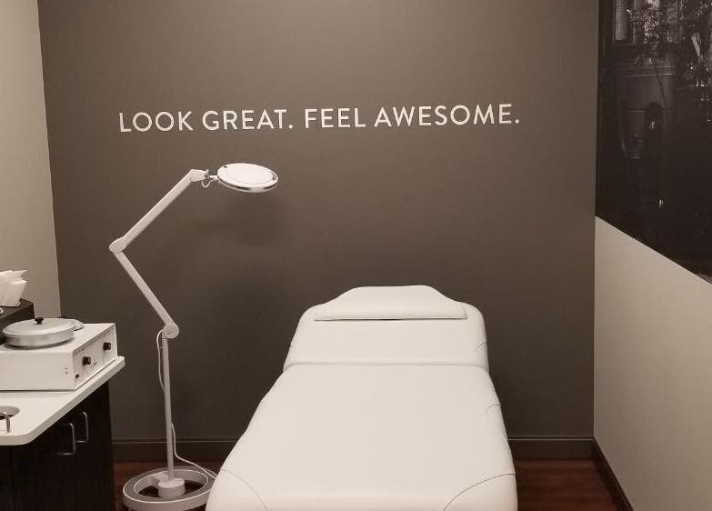 Treatment room at TheWaxBar.LA in Cudahy, California, US with a spa bed and stylish decor.