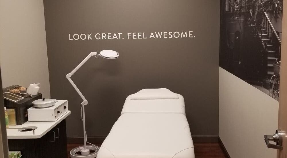 Treatment room at TheWaxBar.LA in Cudahy, California, US with a spa bed and stylish decor.