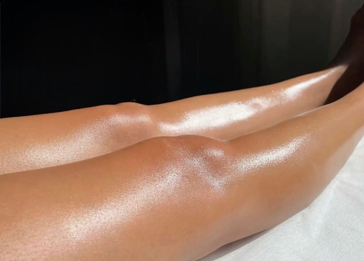 Gleaming legs post-waxing at TheWaxBar.LA, Cudahy, California, US. Flawless shine and silky smooth.