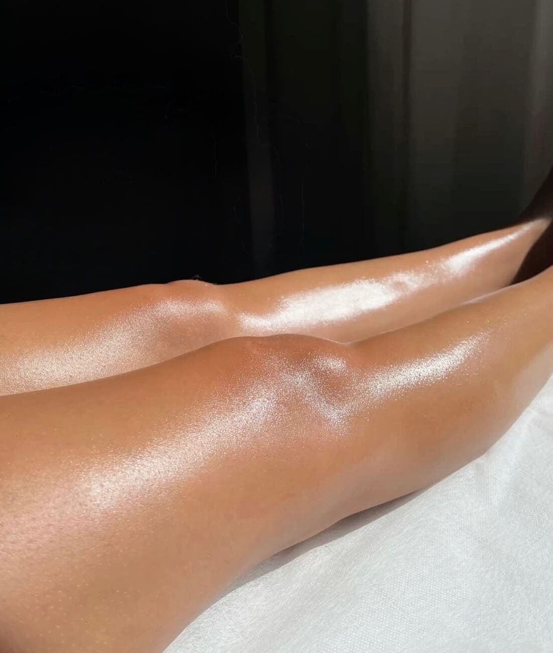 Gleaming legs post-waxing at TheWaxBar.LA, Cudahy, California, US. Flawless shine and silky smooth.