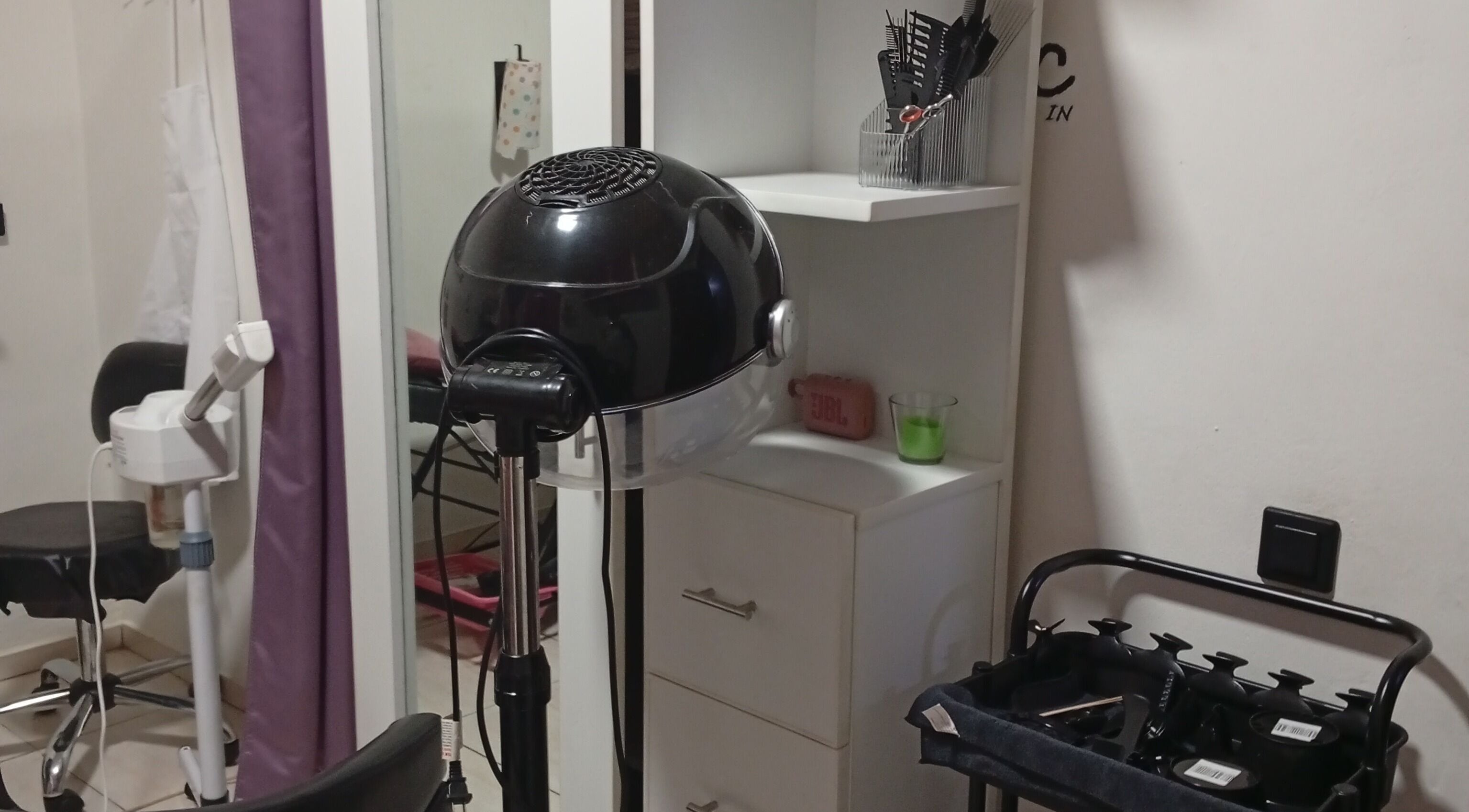 Hair styling equipment at Curlaholic, Paramaribo, Paramaribo, SR, showcasing modern beauty tools.