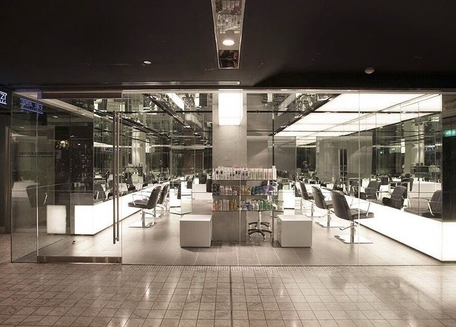 Modern salon interior at KARL AZZI Hairdressers - Westfield Sydney, Sydney, New South Wales, AU, showcasing sleek design.