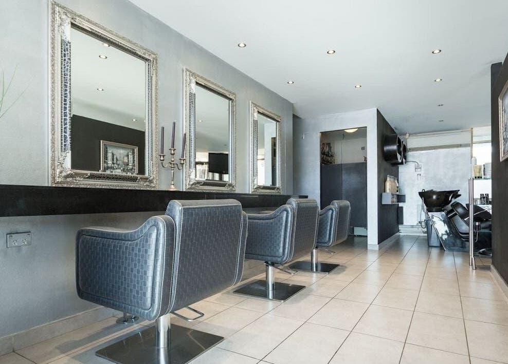 Elegant styling chairs and mirrors at KARL AZZI Hairdressers - Hunters Hill, New South Wales, AU.
