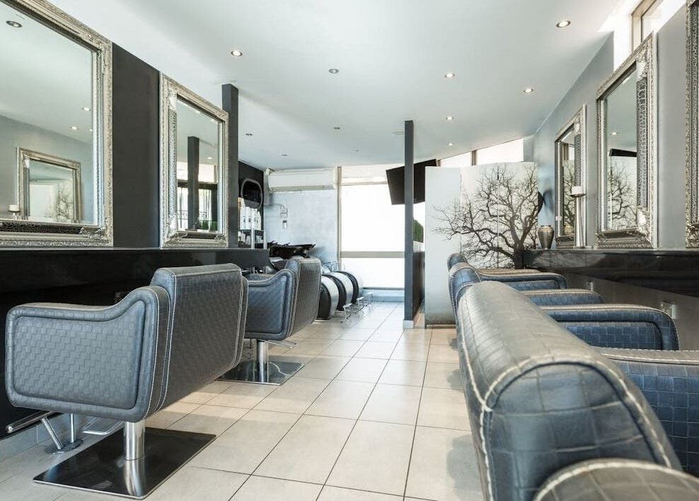 Elegant interior of KARL AZZI Hairdressers - Hunters Hill, New South Wales, AU with stylish salon chairs.
