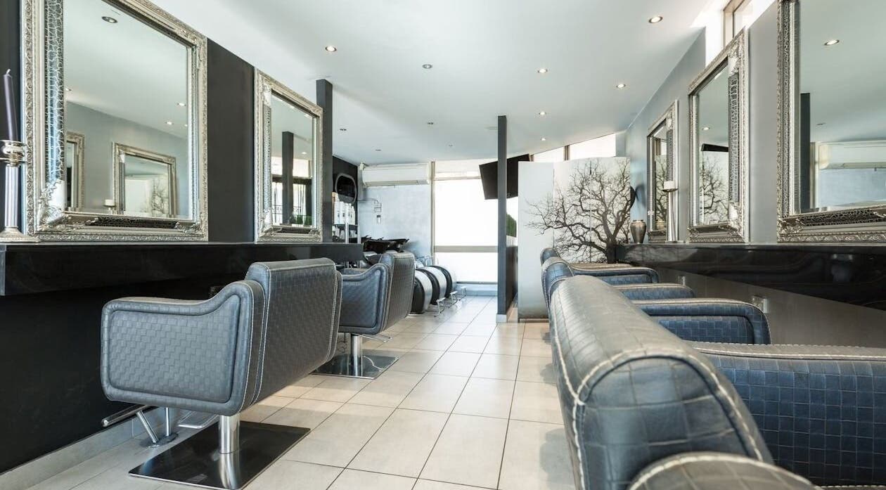 Elegant interior of KARL AZZI Hairdressers - Hunters Hill, New South Wales, AU with stylish salon chairs.