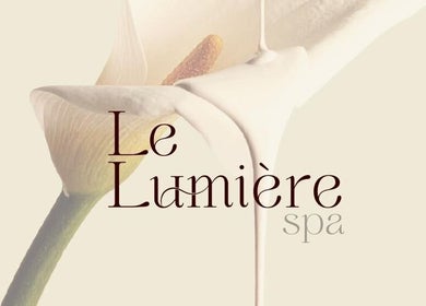 Le Lumiere Spa logo with a lily accentuating elegance, located in SA.