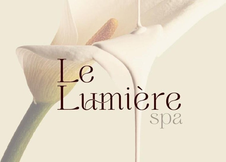 Le Lumiere Spa logo with a lily accentuating elegance, located in SA.